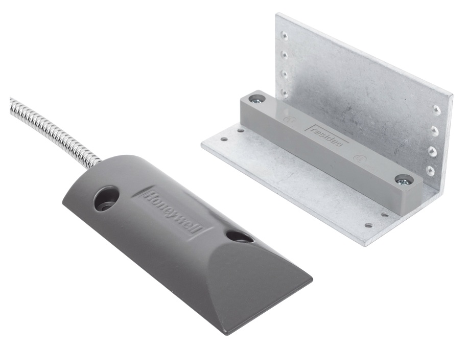 Resideo 4959SN / Contacto magnético | 2605 – Honeywell Home Resideo 4959SN contacto magnético para protección perimetral de cortinas metálicas aéreas y portones de uso rudo, cuenta con un módulo de direccionamiento integrado mediante bus multiplexado